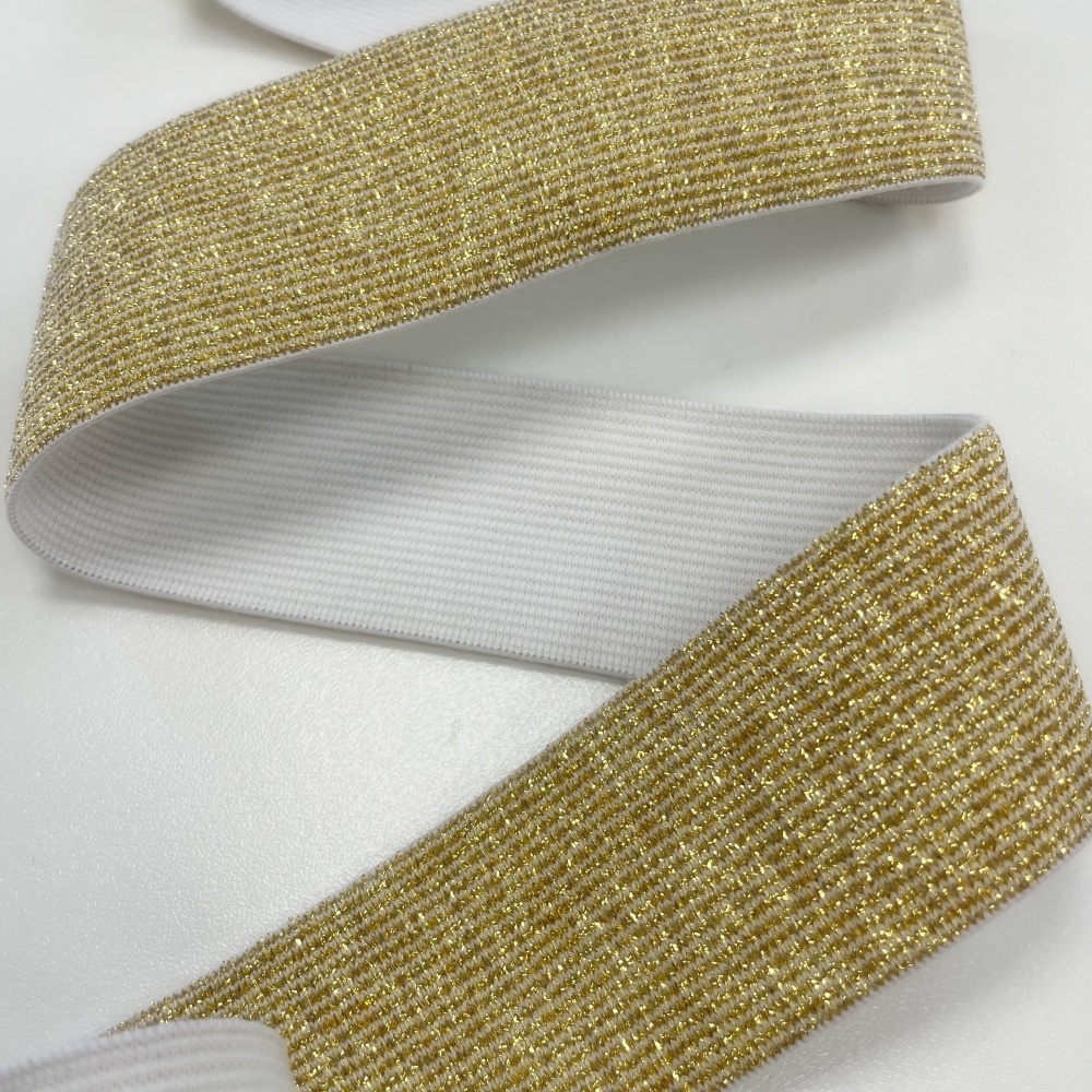 Balta gumija ar zelta spīdumu 40mm Balta gumija ar zelta spīdumu 40mm